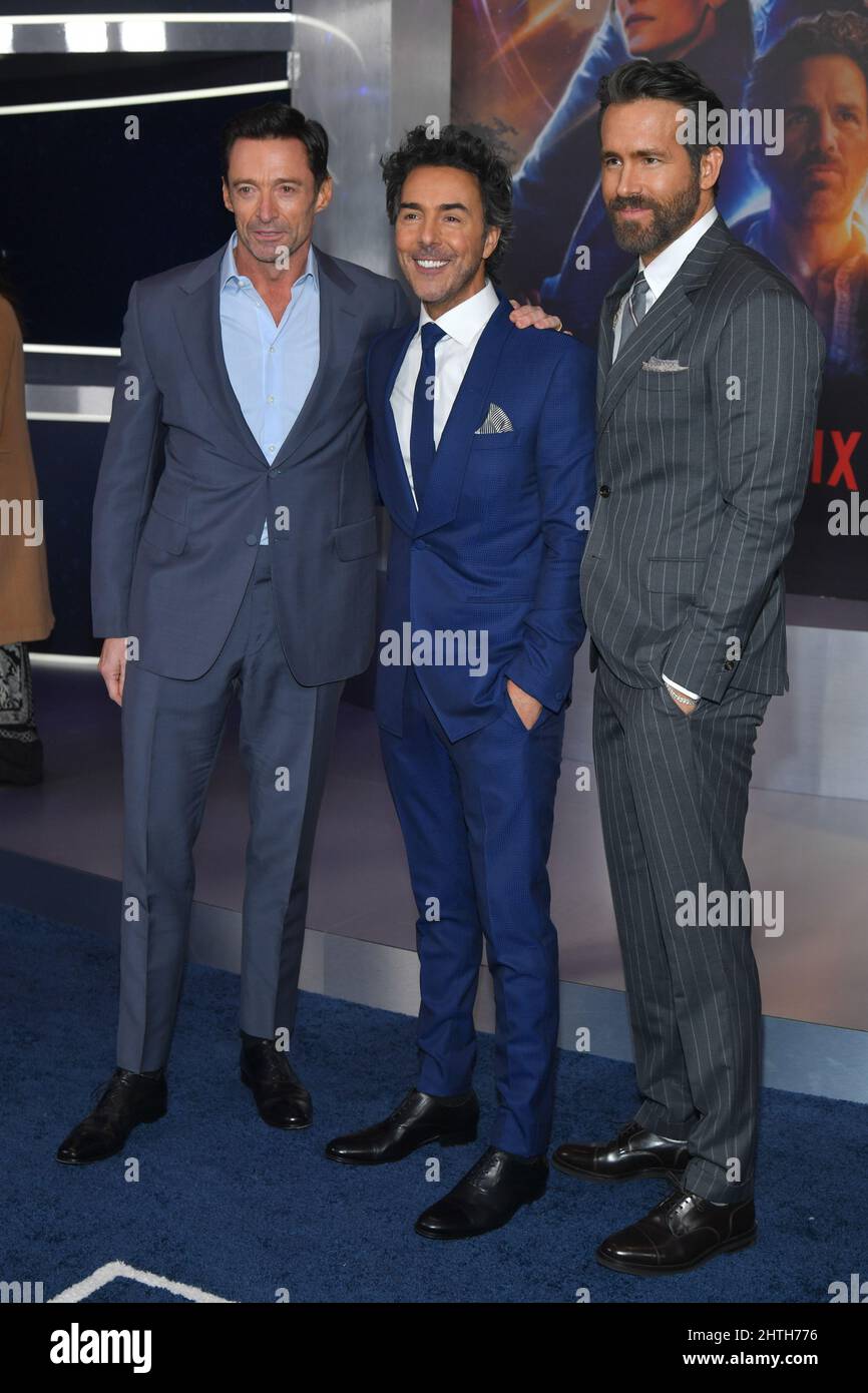 Hugh Jackman, Shawn Levy and Ryan Reynolds attends 'The Adam Project' New York Premiere on February 28, 2022 in New York. Stock Photo