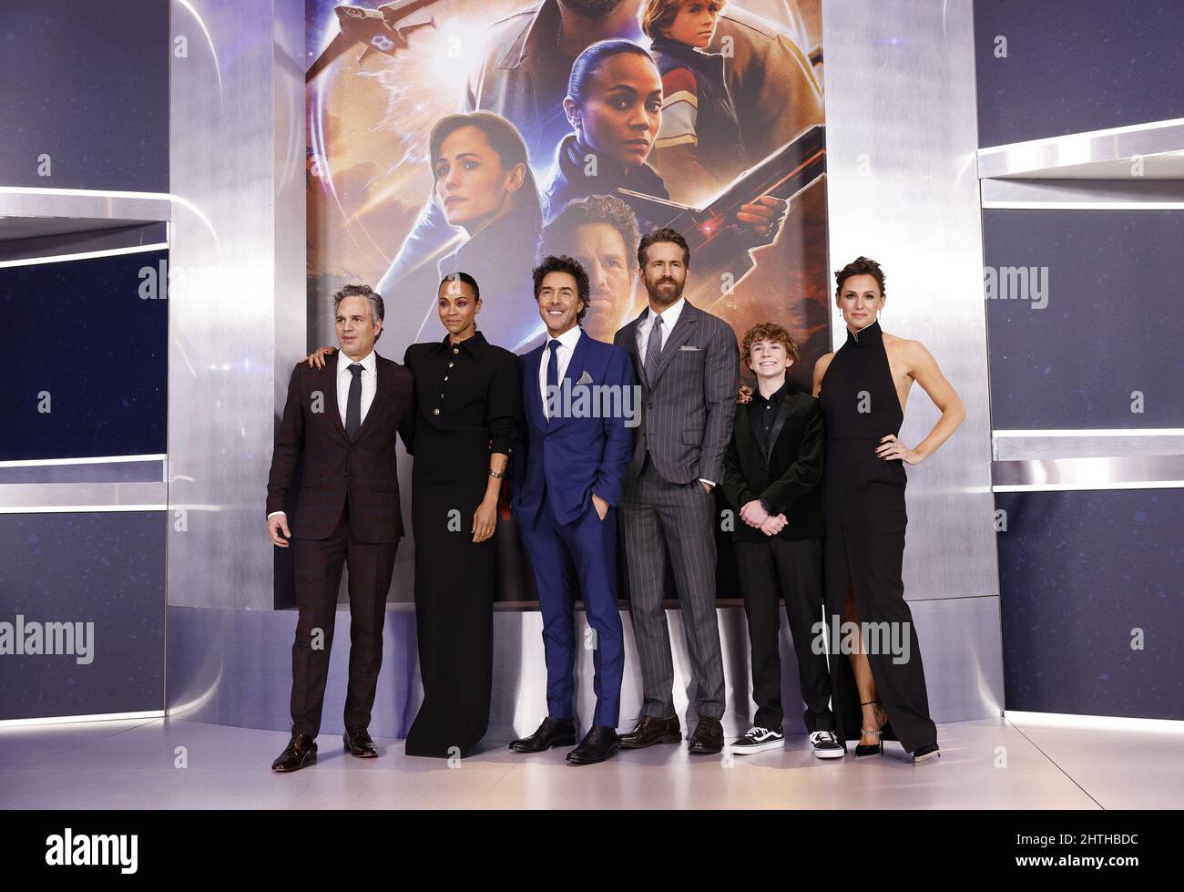 New York, United States. 28th Feb, 2022. Mark Ruffalo, Zoe Saldana, Shawn Levy, Ryan Reynolds, Walker Scobell and Jennifer Garner take a cast photo when they arrive on the red carpet at the Netflix World Premiere of 'The Adam Project' at Alice Tully Hall/Lincoln Center in New York City on Monday, February 28, 2022. Photo by John Angelillo/UPI Credit: UPI/Alamy Live News Stock Photo