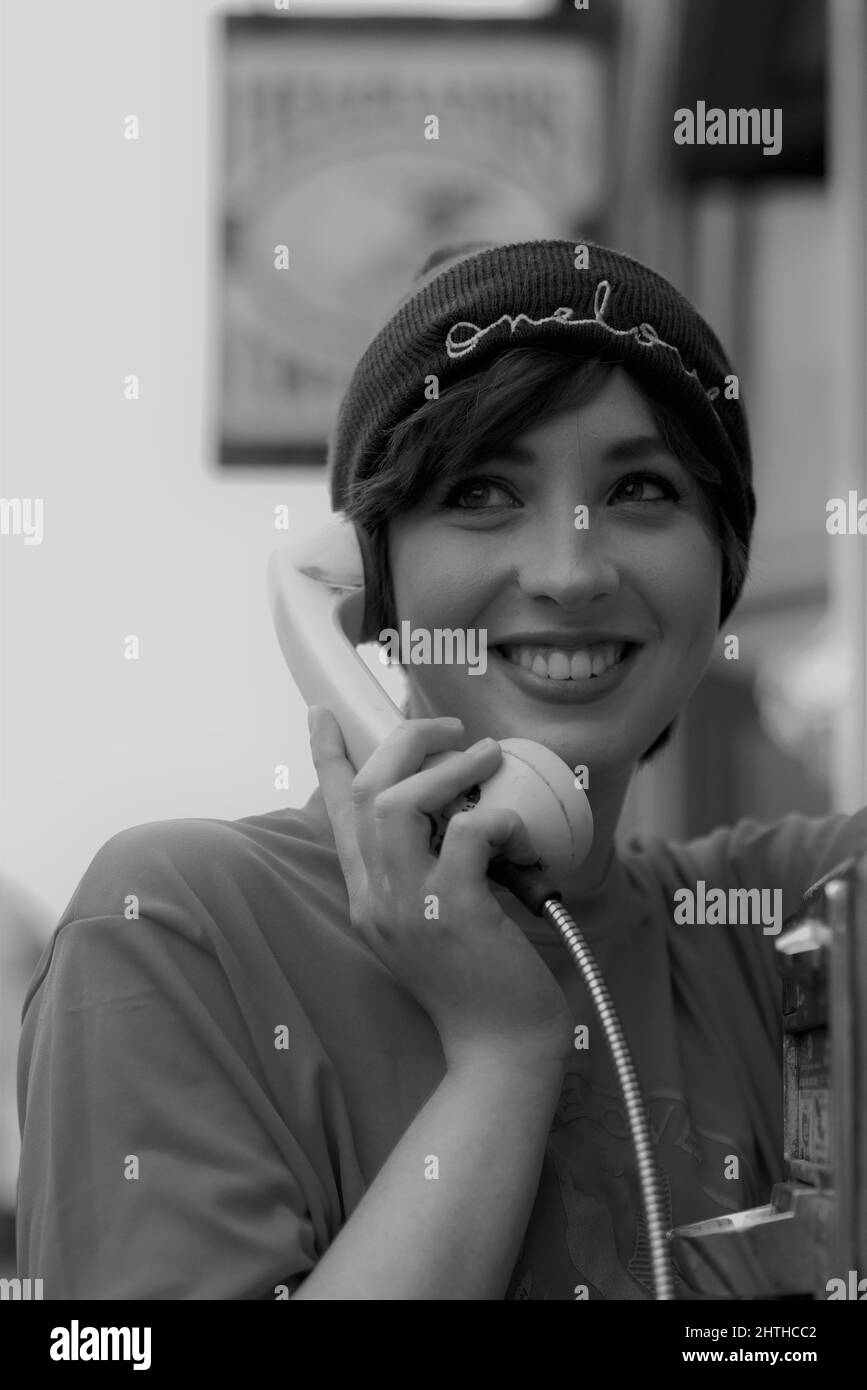 Female using payphone Black and White Stock Photos & Images - Alamy