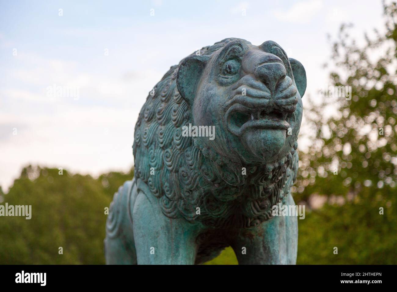 Bronze statue of a lion with traces of corrosion Stock Photo Alamy