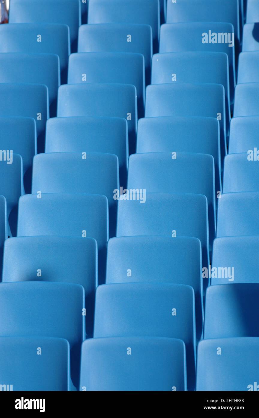 Long rows of blue chairs Stock Photo Alamy