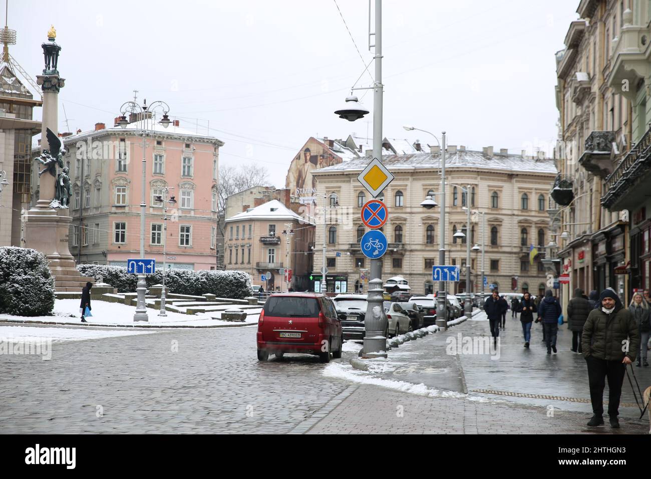 Lviv, Ukraine. 28th Feb, 2022. People walk in a street of Lviv, Ukraine, Feb. 28, 2022. Credit: Chen Wenxian/Xinhua/Alamy Live News Stock Photo