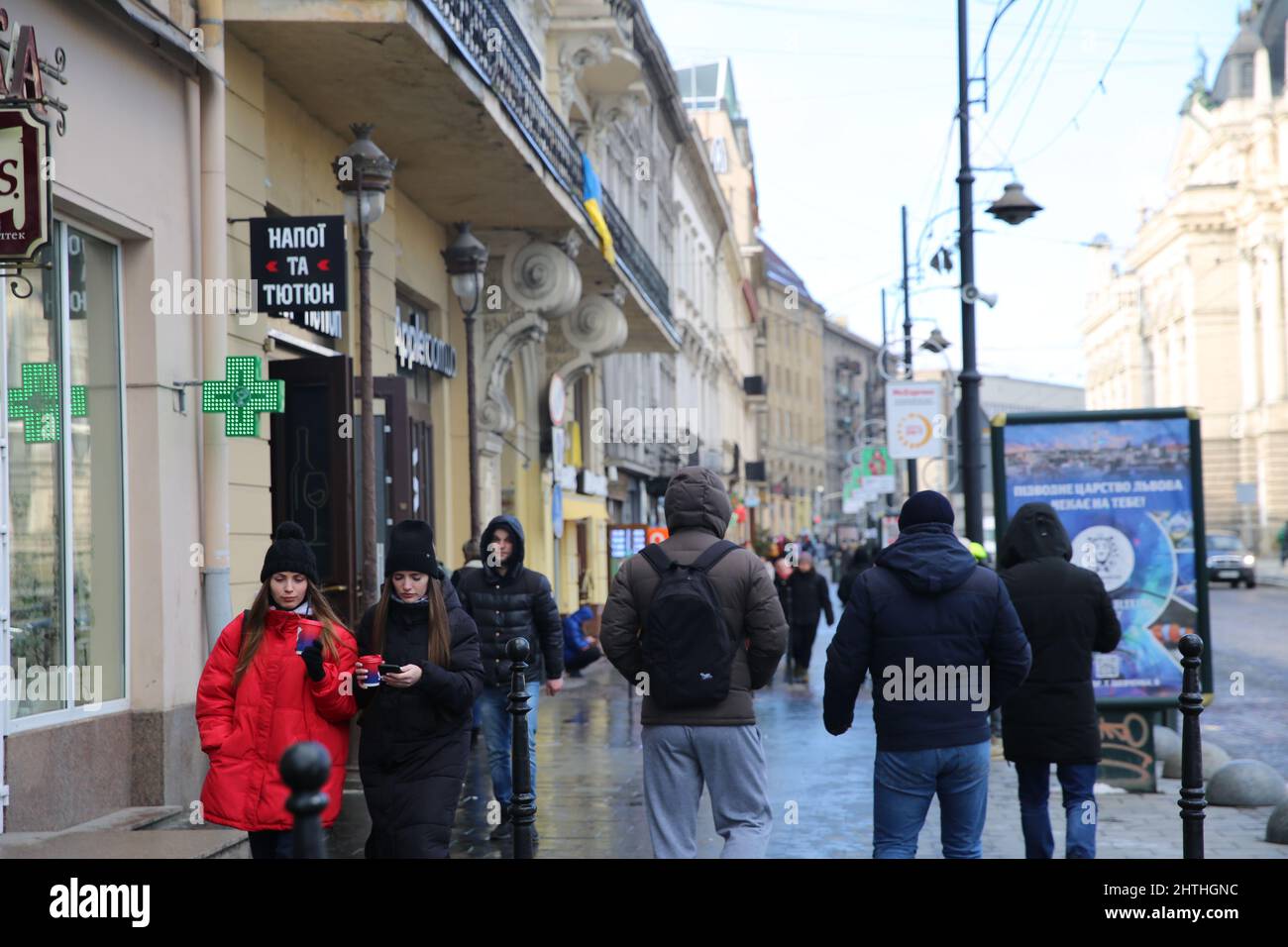 Lviv, Ukraine. 28th Feb, 2022. People walk in a street of Lviv, Ukraine, Feb. 28, 2022. Credit: Chen Wenxian/Xinhua/Alamy Live News Stock Photo