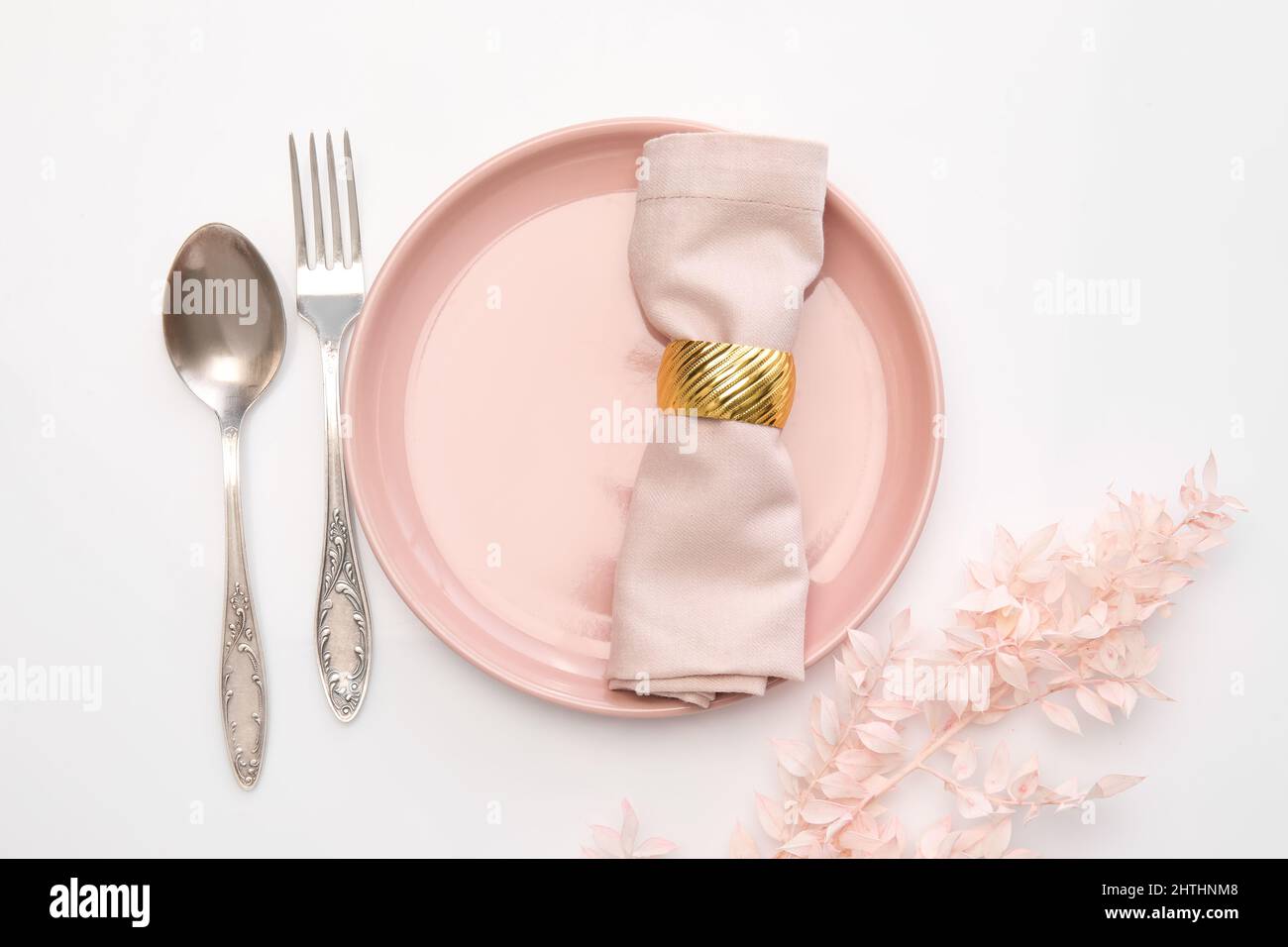 Elegant table setting on white background Stock Photo - Alamy