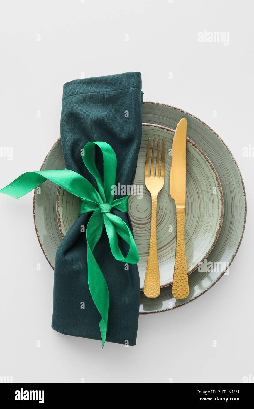 Elegant table setting on white background Stock Photo - Alamy