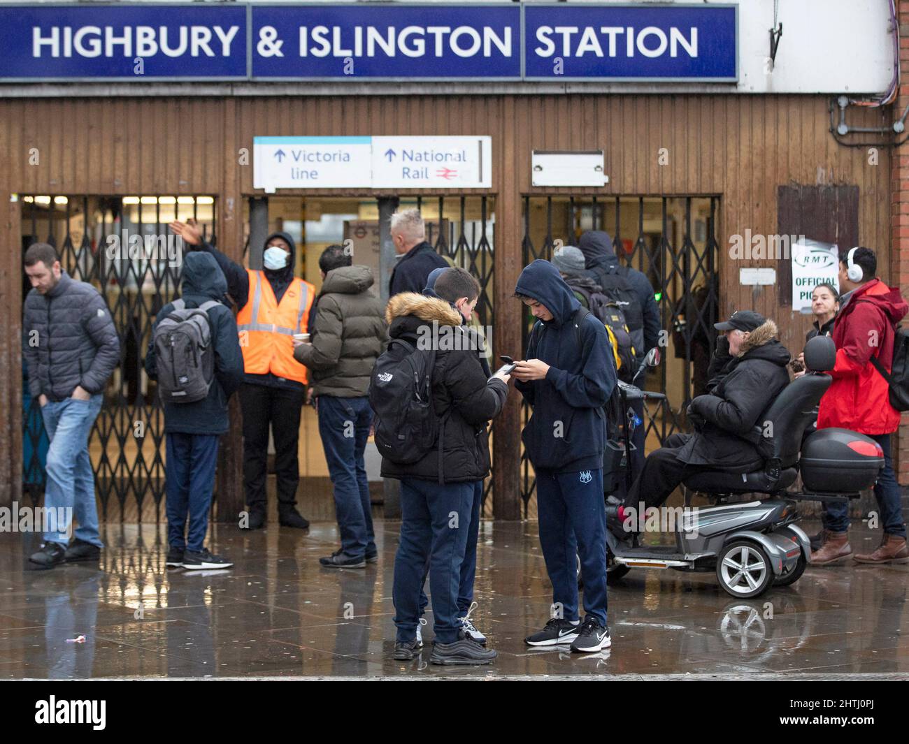 01/03/2022. London, UK. Commuters are seen challenging on strike TFL workers as they arrive at a closed Highbury and Islington Tube Station, as staff Stock Photo