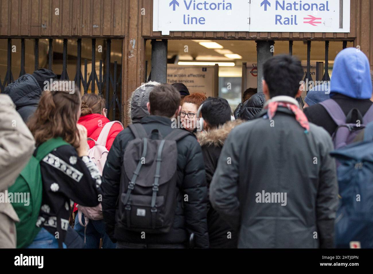 01/03/2022. London, UK. Commuters are seen challenging on strike TFL workers as they arrive at a closed Highbury and Islington Tube Station, as staff Stock Photo