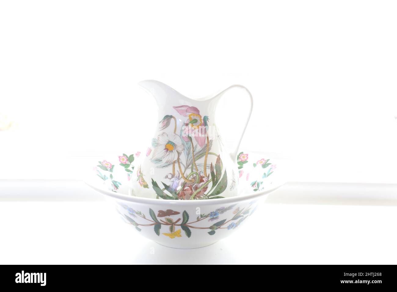 Coldport, white wash jug and bason with floral pattern, ewer and bowl. Stock Photo