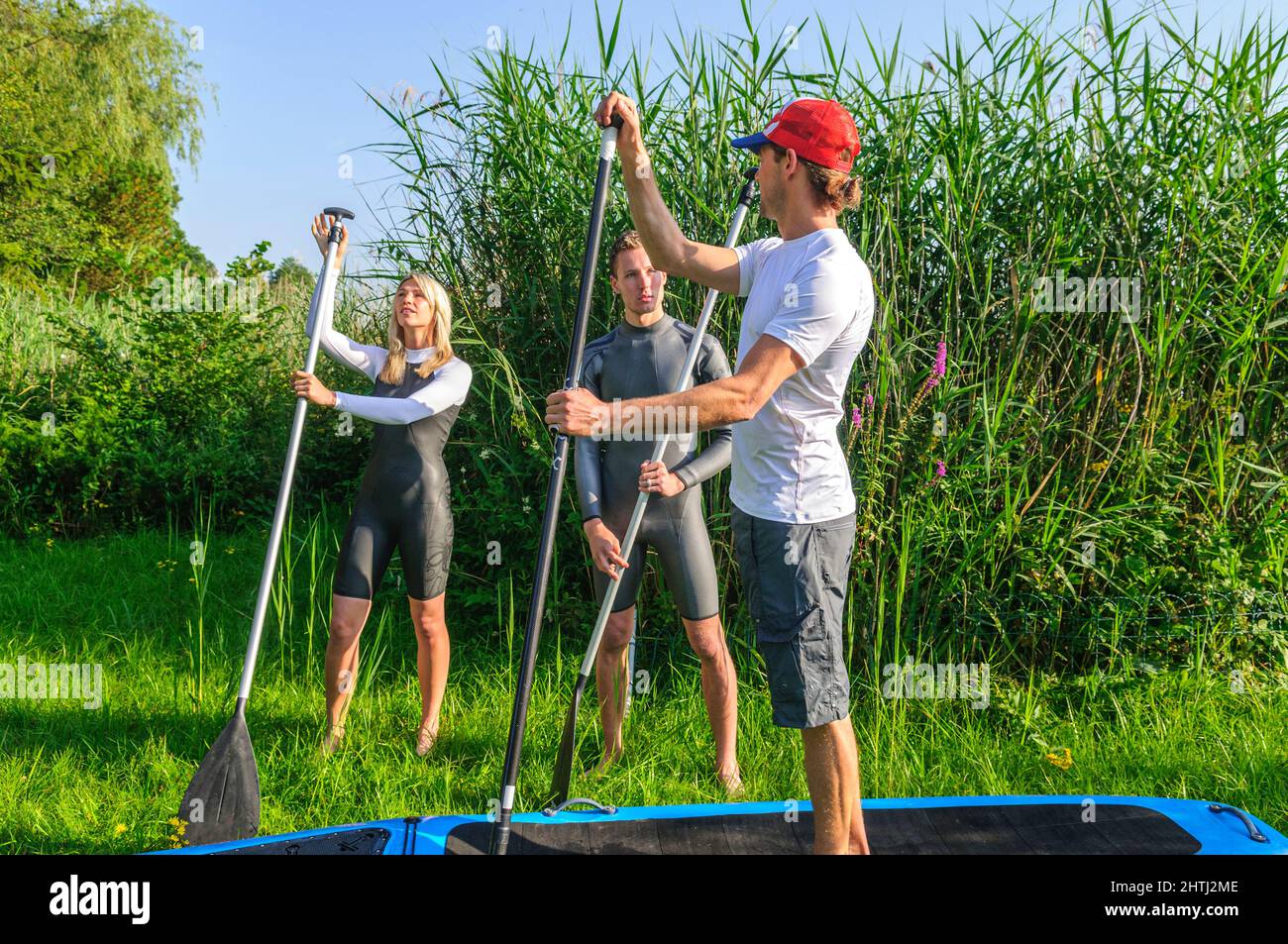 Introduction to the trend sport stand up paddling Stock Photo Alamy