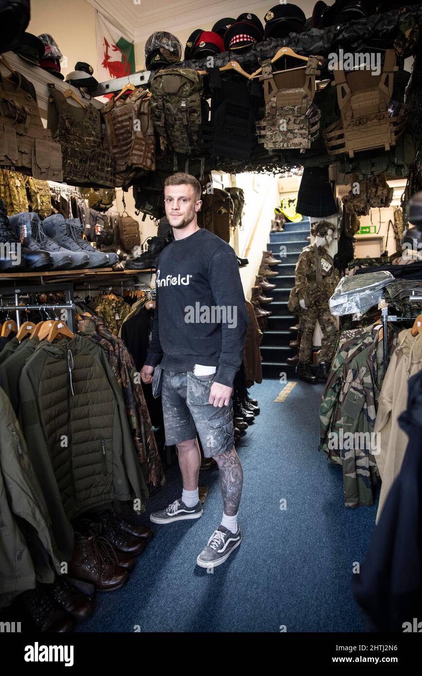 Picture shows a former British Paratrooper buying army surplus at G4