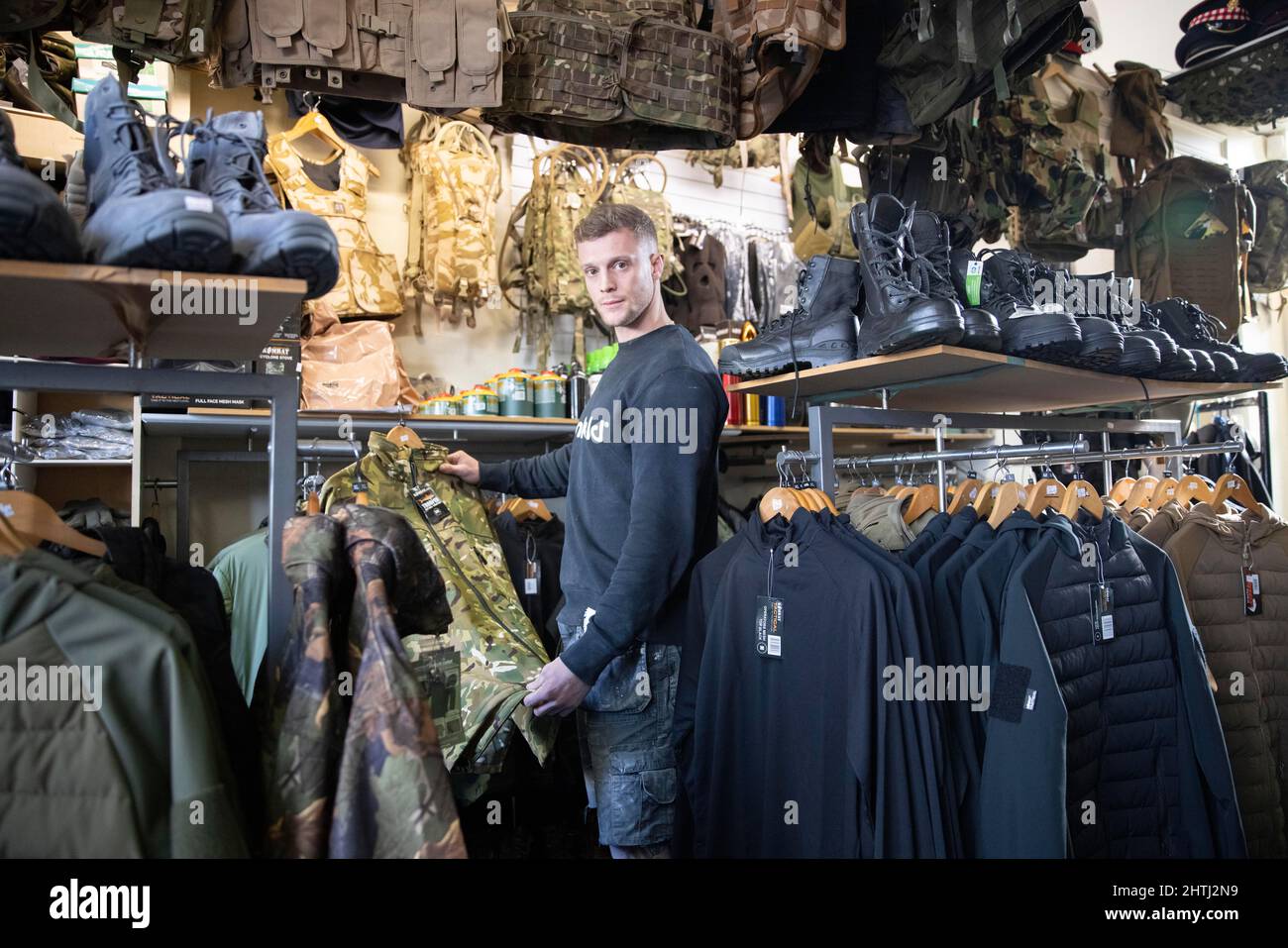Picture shows a former British Paratrooper buying army surplus at G4