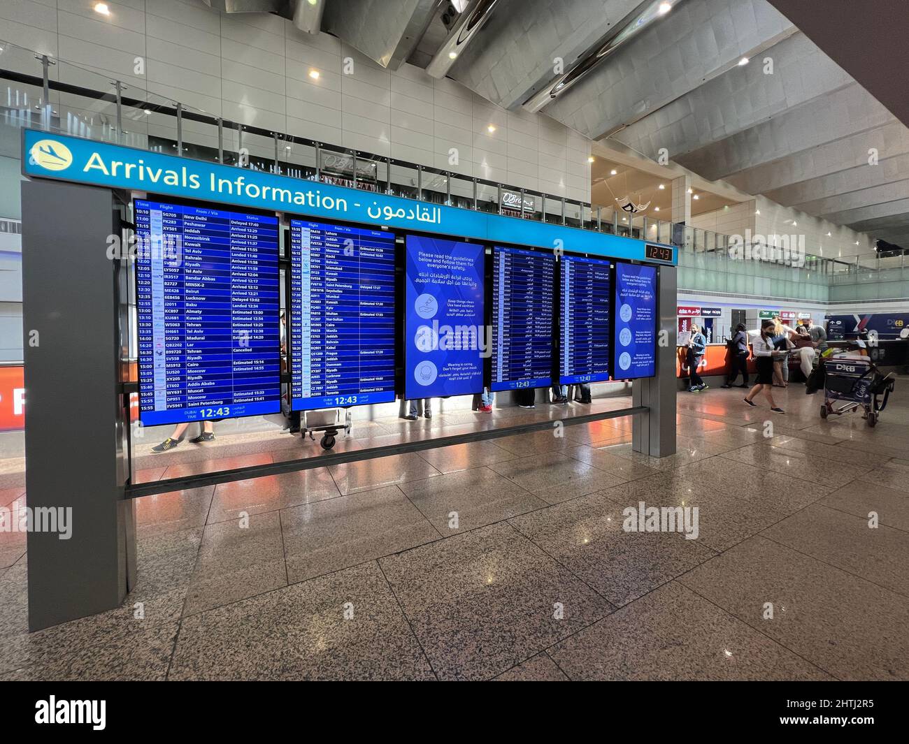 UAE, Dubai - December 02, 2021: Dubai International Airport Arrival lounge. Flight Information Board Stock Photo