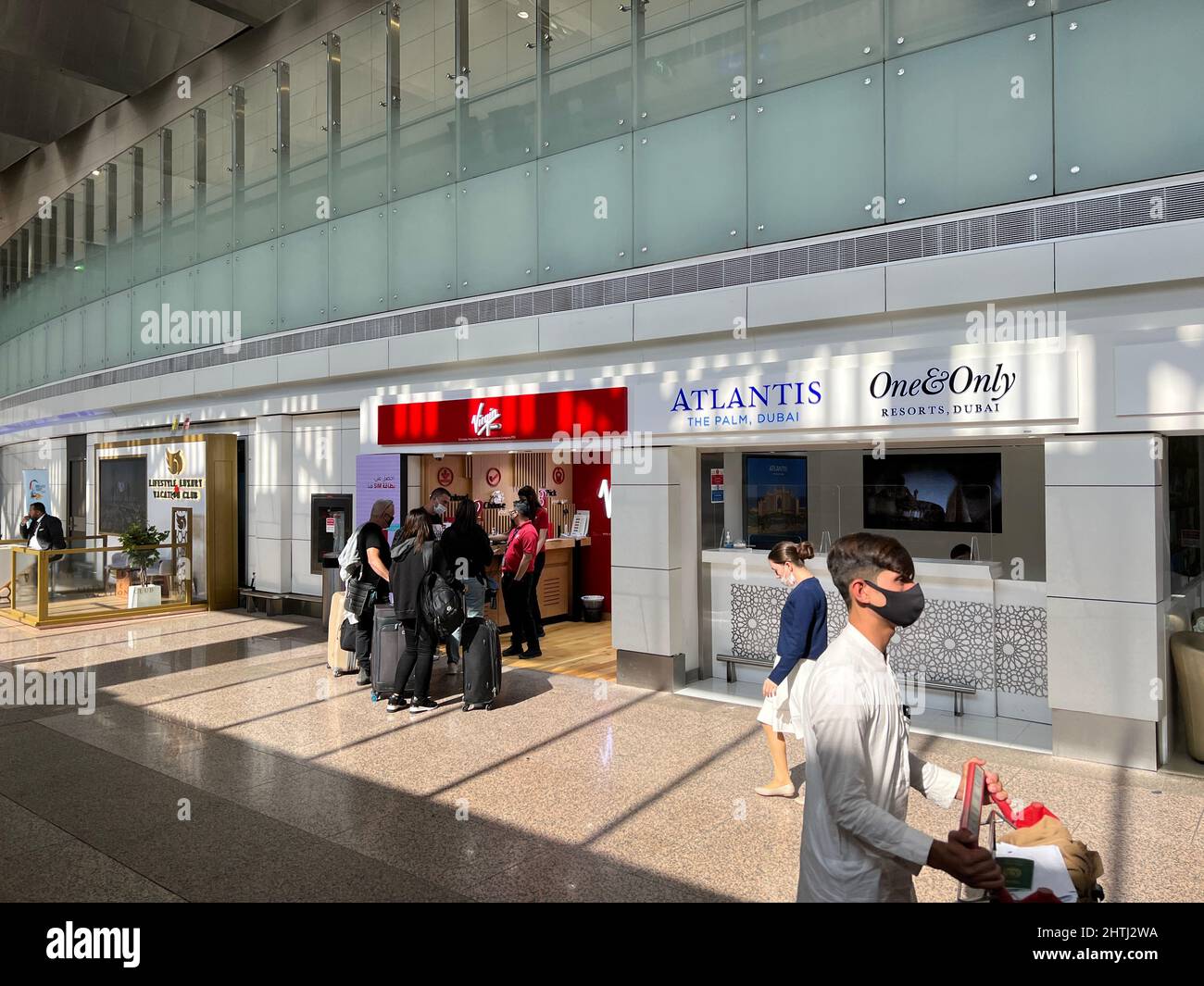 UAE, Dubai - December 02, 2021: Dubai International Airport Arrival lounge. Flight Information Board Stock Photo
