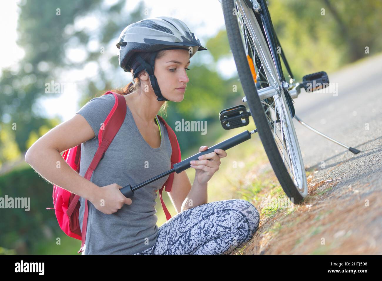 Bicycle tyre pumping hires stock photography and images Alamy