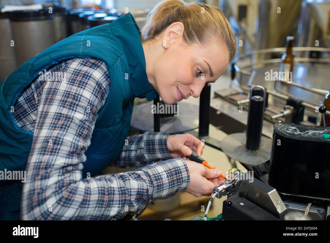 young beautiful milling machining worker Stock Photo