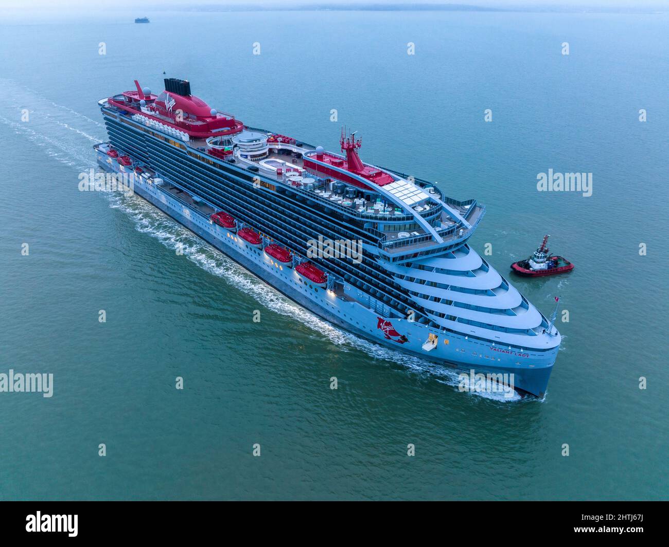 Valiant lady cruise ship by Virgin Voyages arriving at Portsmouth International Port England, early morning Stock Photo