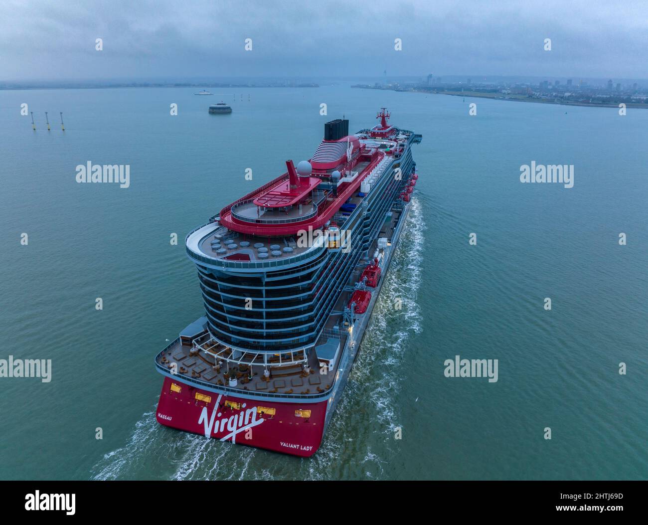 Valiant lady cruise ship by Virgin Voyages arriving at Portsmouth International Port England, early morning Stock Photo