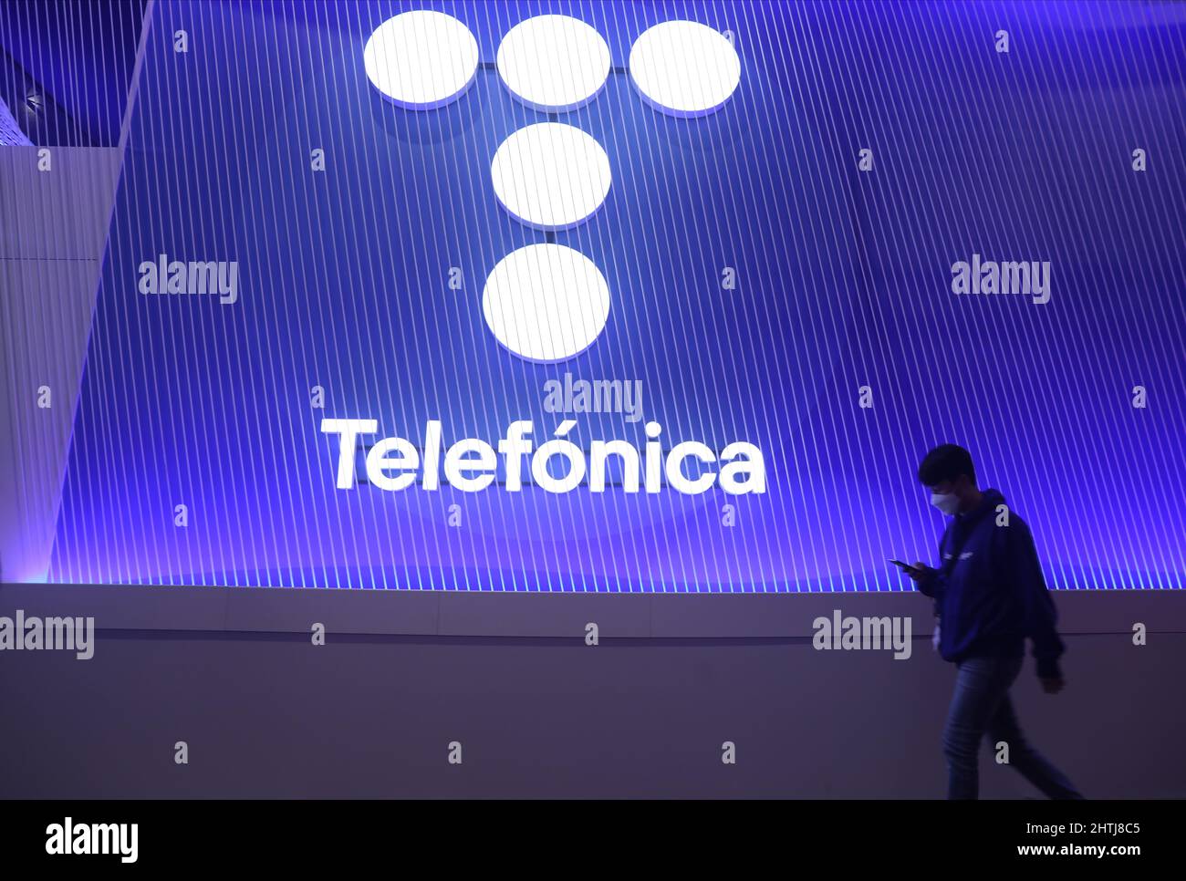 Barcelona, Spain. 28th Feb, 2022. A visitor walks past the Telefonica’s ...