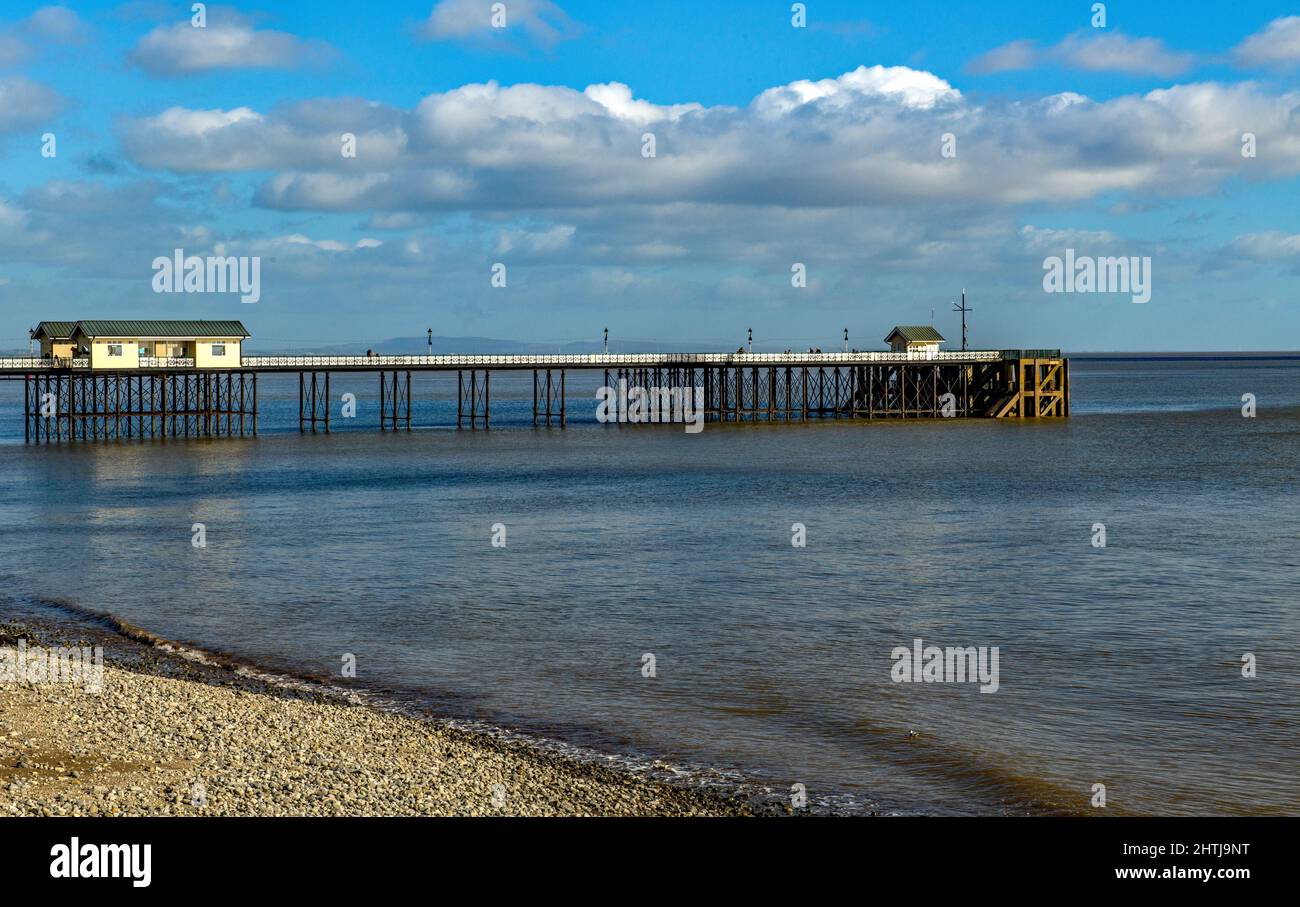 Looking out at the pier on the seafront at Penarth in the Vale of Glamorgan in south Wales on a sunny February day Stock Photo