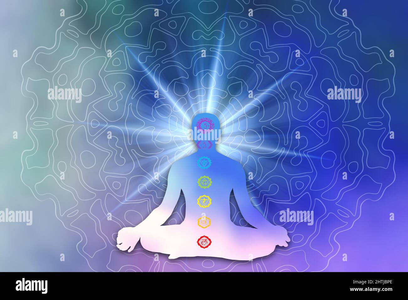 human figure in yoga pose lotus with chakras Stock Photo