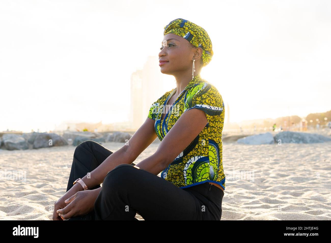 African woman sitting cross legged hi-res stock photography and images ...