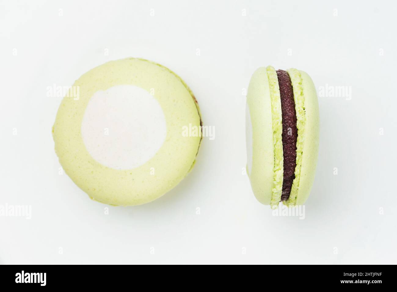 From above sweet round green macaroons with white spots and tasty ...