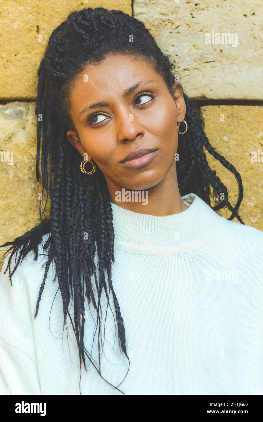 Vertical portrait of a beautiful young African American female with ...