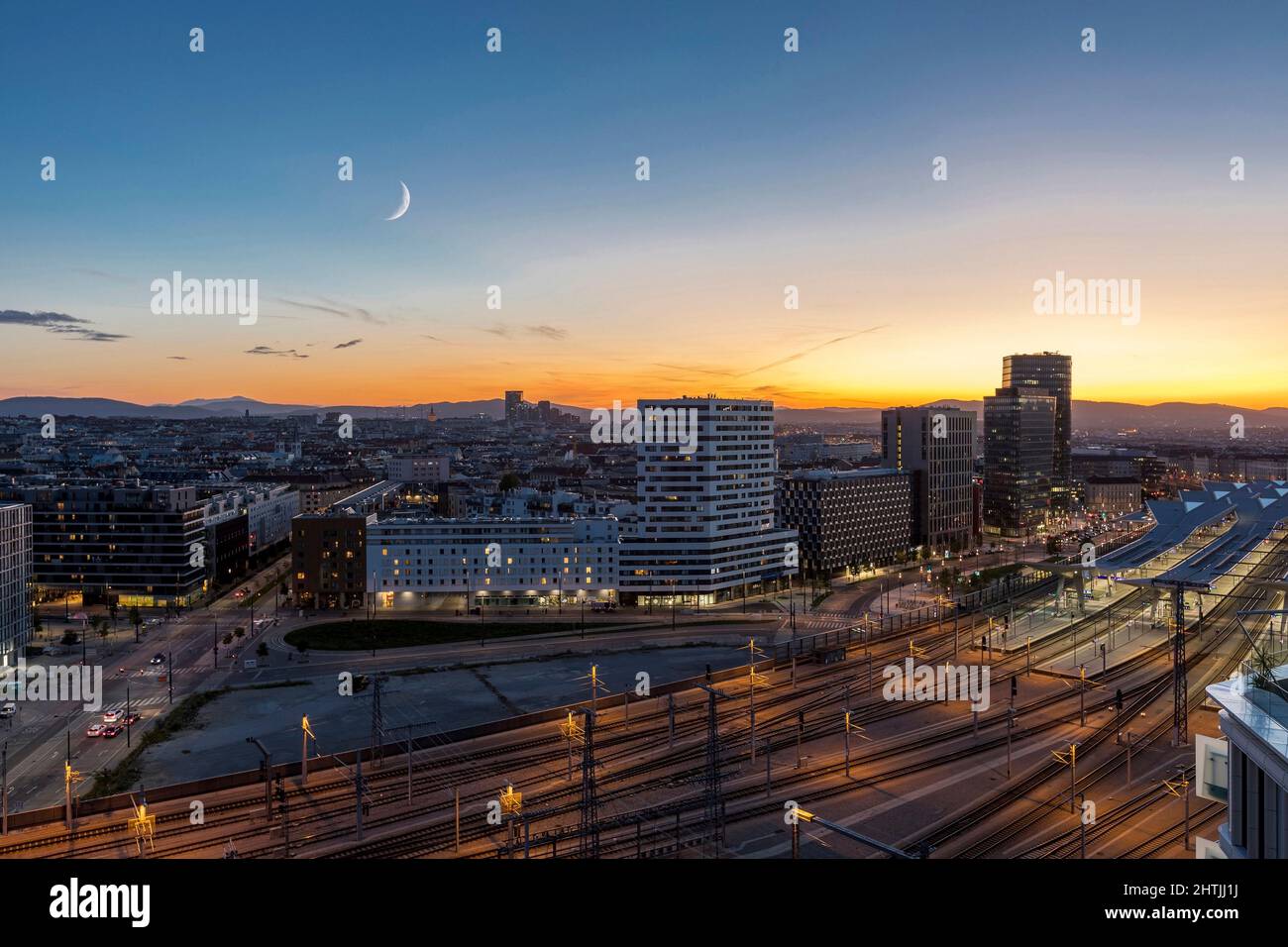 Sunset over the new revitalized 10 district of Vienna and its new main railway station. Stock Photo