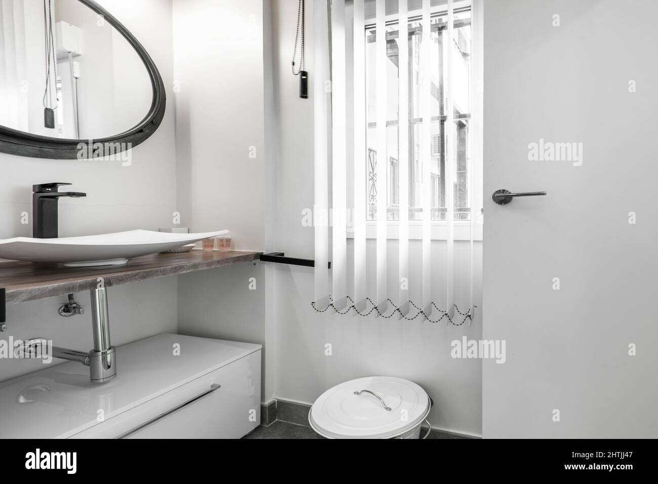 Small bathroom with marble countertop, porcelain sink without insert ...