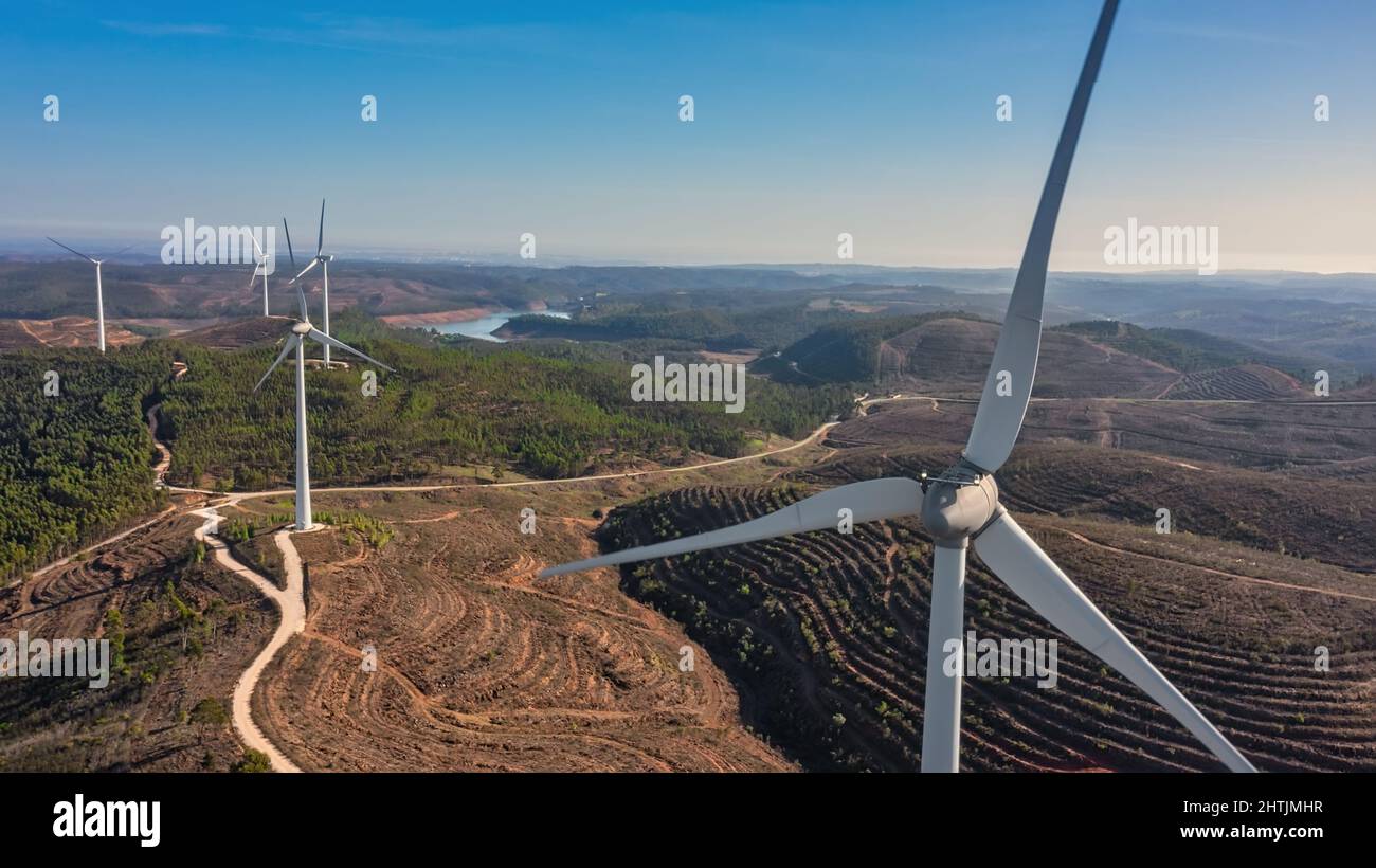 Aerial view wind turbine eco friendly renewable energy concept on Portuguese mountains background. Stock Photo