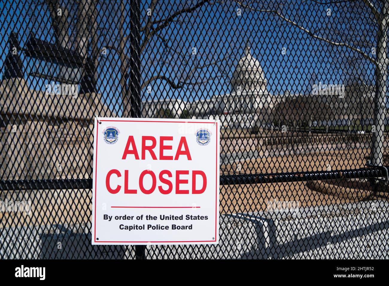 (220301) -- WASHINGTON, D.C., March 1, 2022 (Xinhua) -- Photo taken on Feb. 28, 2022 shows the U.S. Capitol building, seen through a barrier fence, in Washington, DC, the United States. Fencing has been reinstalled around the U.S. Capitol ahead of President Joe Biden's State of the Union address slated for Tuesday night. (Xinhua/Liu Jie) Credit: Liu Jie/Xinhua/Alamy Live News Stock Photo