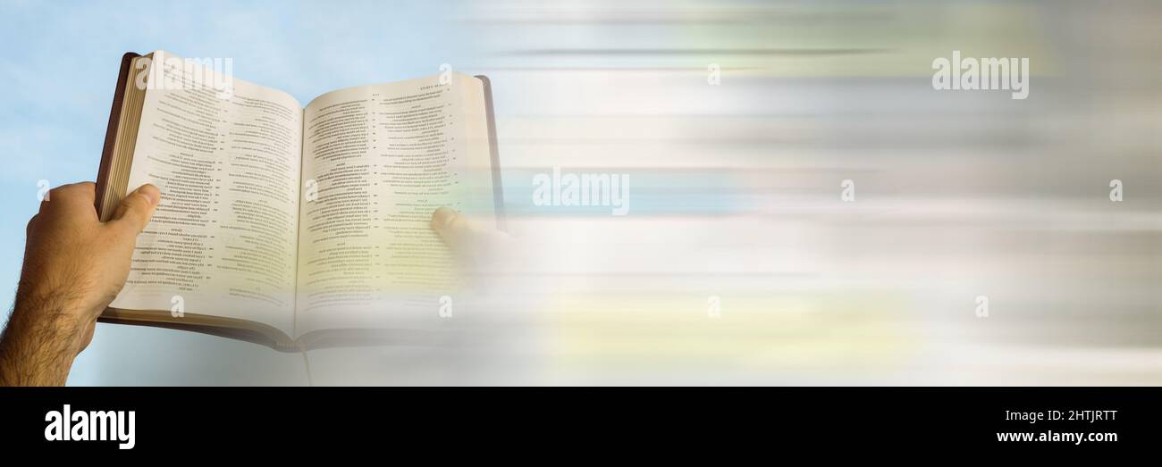 Close up view of hand holding a holy bible with copy space Stock Photo ...