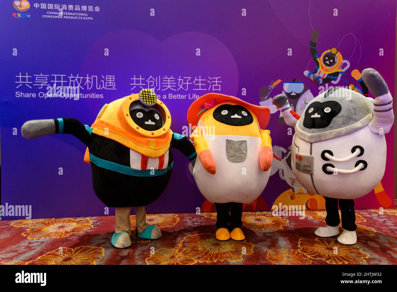 (220301) -- HAIKOU, March 1, 2022 (Xinhua) -- Photo taken on March 1, 2022 shows the mascots for the 2022 China International Consumer Products Expo, styled after the Hainan gibbon, in Haikou, south China's Hainan Province. Hainan gibbons are the most endangered of all gibbons and the world's rarest primate. They are endemic to the southern Chinese island of Hainan. The mascots reflect the green consumption approach of the expo, according to Ruslan Tulenov, a global media officer at the Hainan Provincial Bureau of International Economic Development. The mascots embody the three dominant and Stock Photo