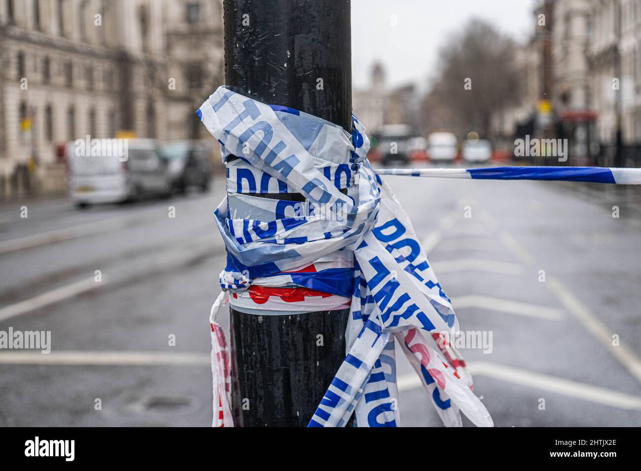 1 March 2022. Police cordon tapes in London tied to a post Stock Photo