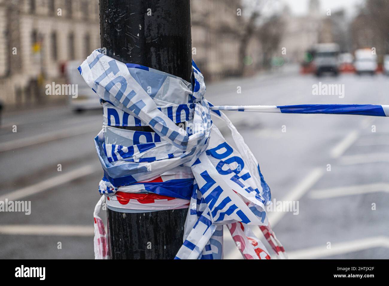 1 March 2022. Police cordon tapes in London tied to a post Stock Photo
