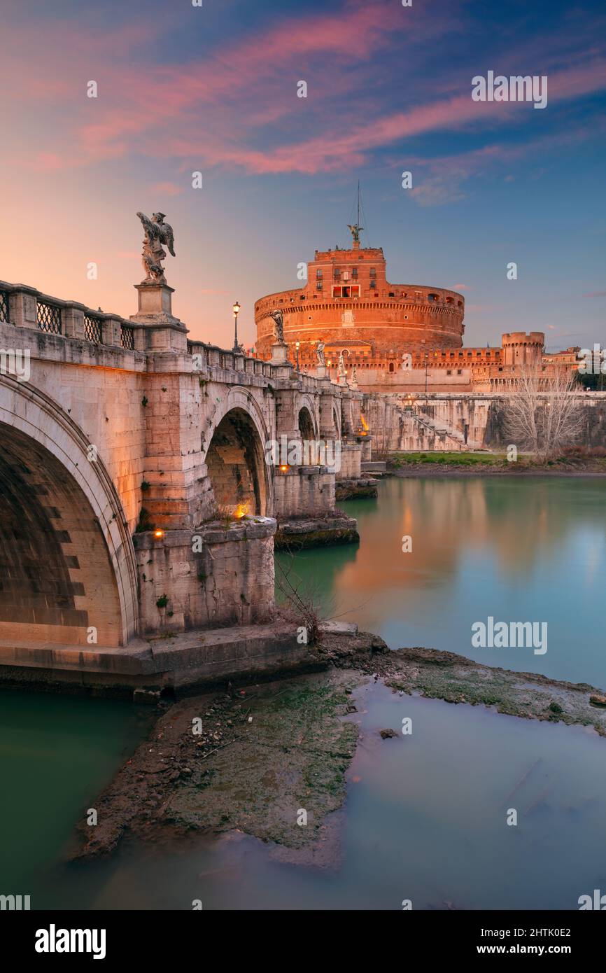 Rome, Italy. Image of the Castle of the Holy Angel (Castle of Sant Angelo) and Holy Angel Bridge (Ponte Sant Angelo) over the Tiber River in Rome at s Stock Photo