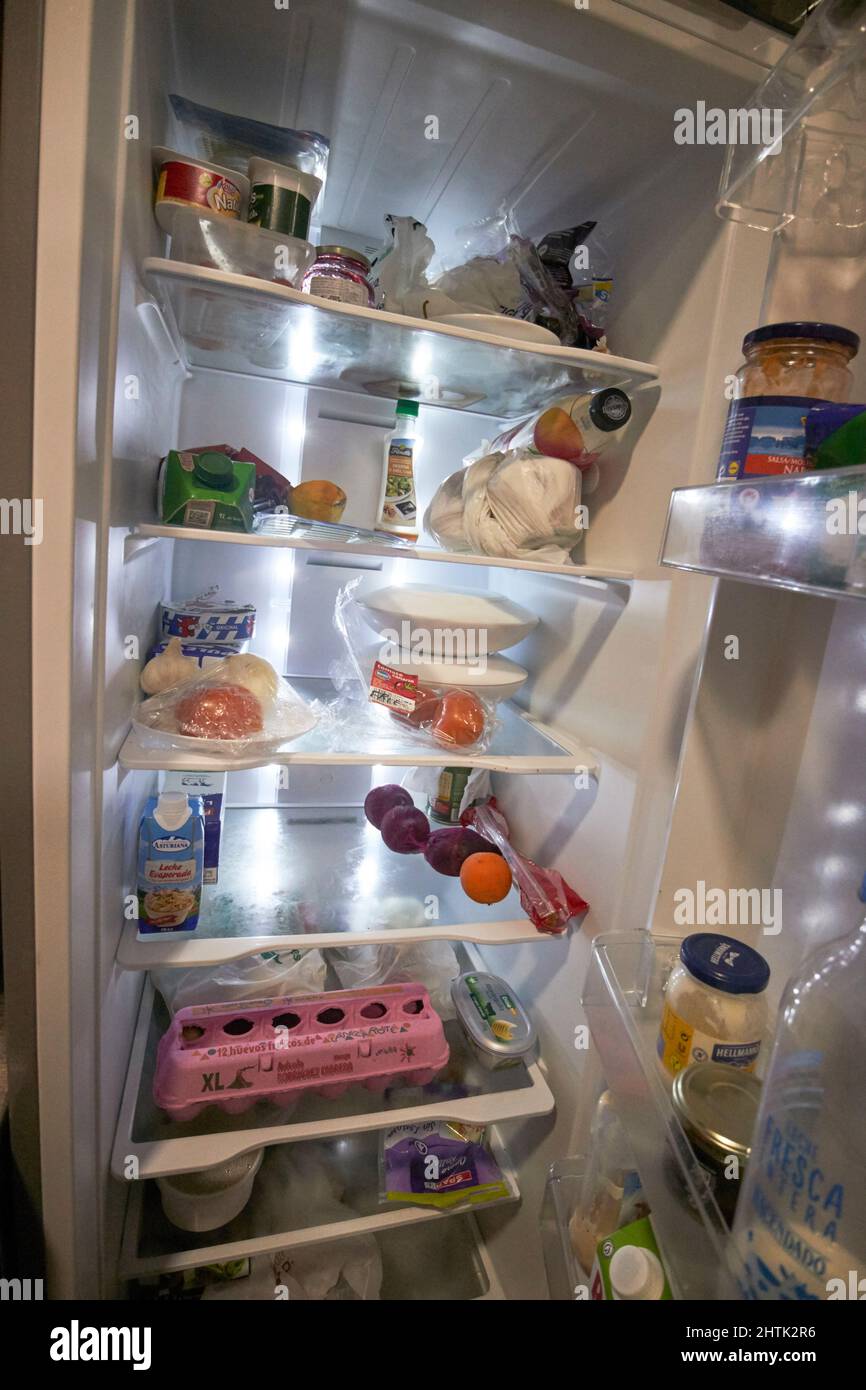 individual food marked and labelled in a communal fridge in a hostel Lanzarote, canary islands, spain Stock Photo