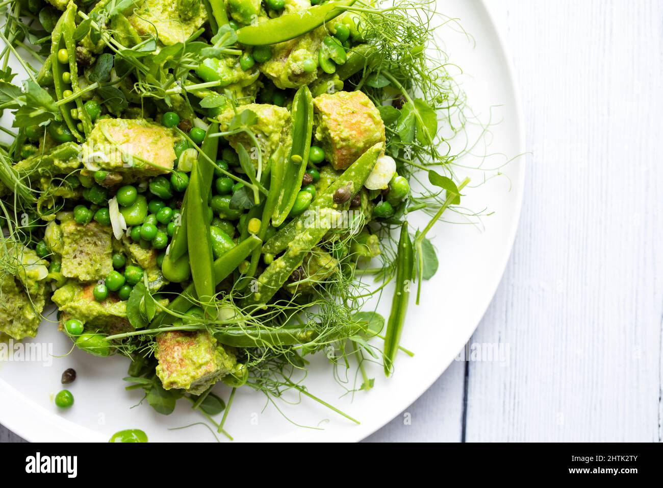 Pea shoots and broad beans panzanella Stock Photo Alamy