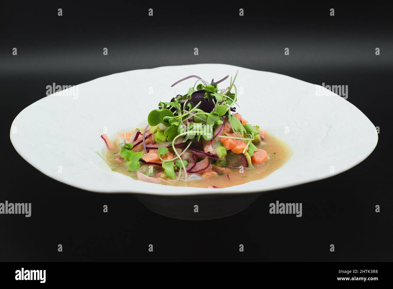 Traditional Peruvian Ceviche, colorful dish made with raw White fish