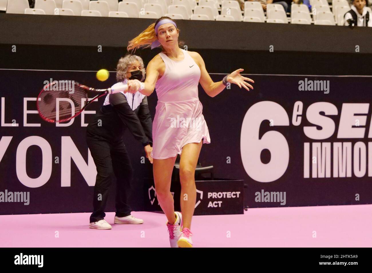 Stefanie Voegele (SUI) in action against Elsa Jacquemot (FRA) during the Open 6eme Sens, Metropole de Lyon 2022, WTA 250 tennis tournament on February 28, 2022 at Palais des Sports de Gerland in Lyon, France - Photo: Patrick Cannaux/DPPI/LiveMedia Stock Photo