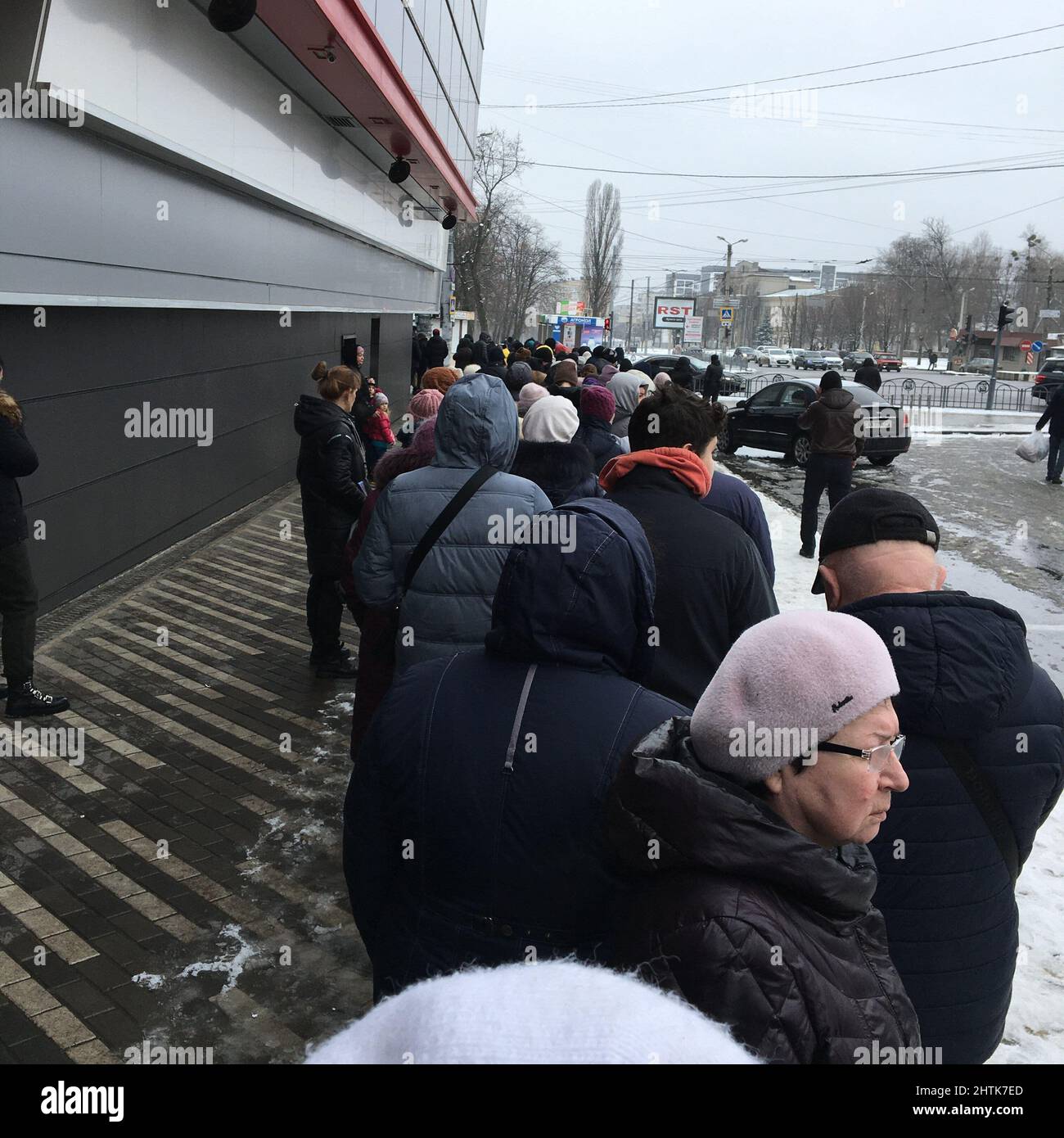 A long line to enter the supermarket in Kharkiv, as a result of the siege of Kharkiv by Russian troops in February 2022, and blocking by the russians the food supply to a million city. Credit: Gusty/Alamy Live News Stock Photo