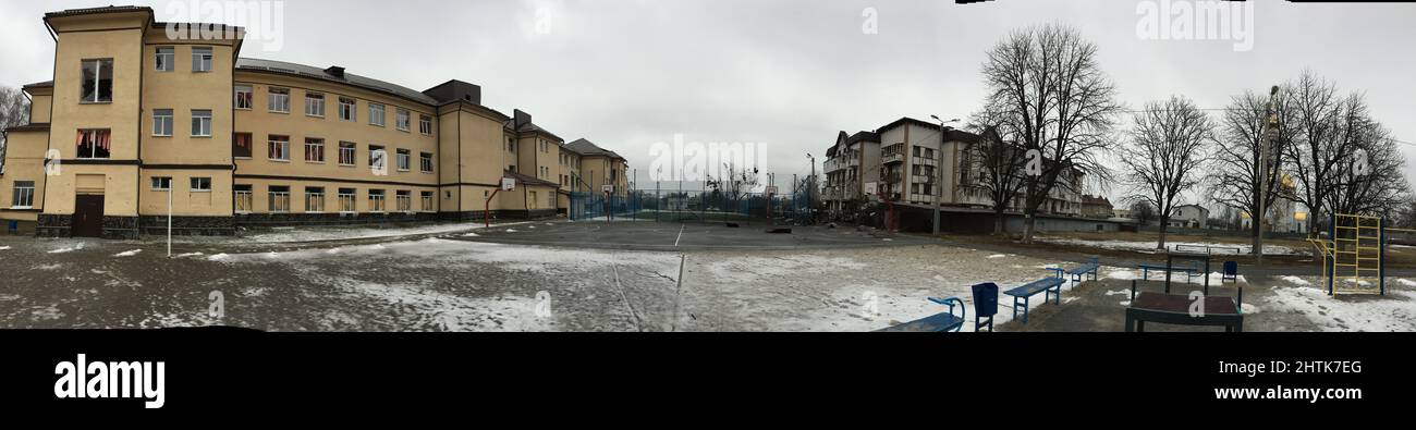 Kharkiv, Ukraine. Russian missile strike to the schoolyard, school #108, of Kharkiv, at 5 a.m., of the March 01/03/2022, in front of the apartment house, with many burned cars, wounded people, destroyed school building and the house Credit: Gusty/Alamy Live News Stock Photo