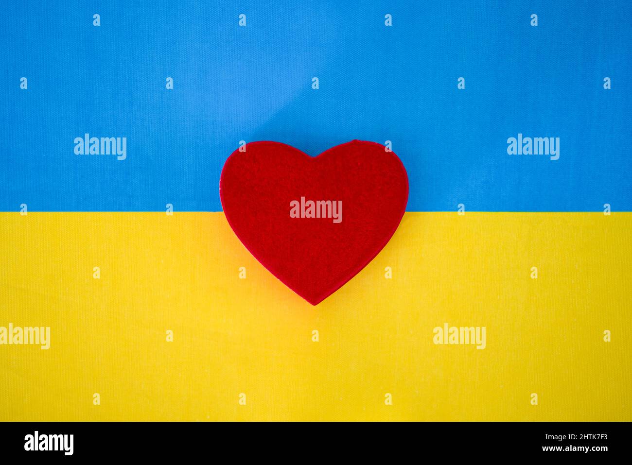 The flag of Ukraine and the heart. The concept of peace and love in Ukraine. Stock Photo