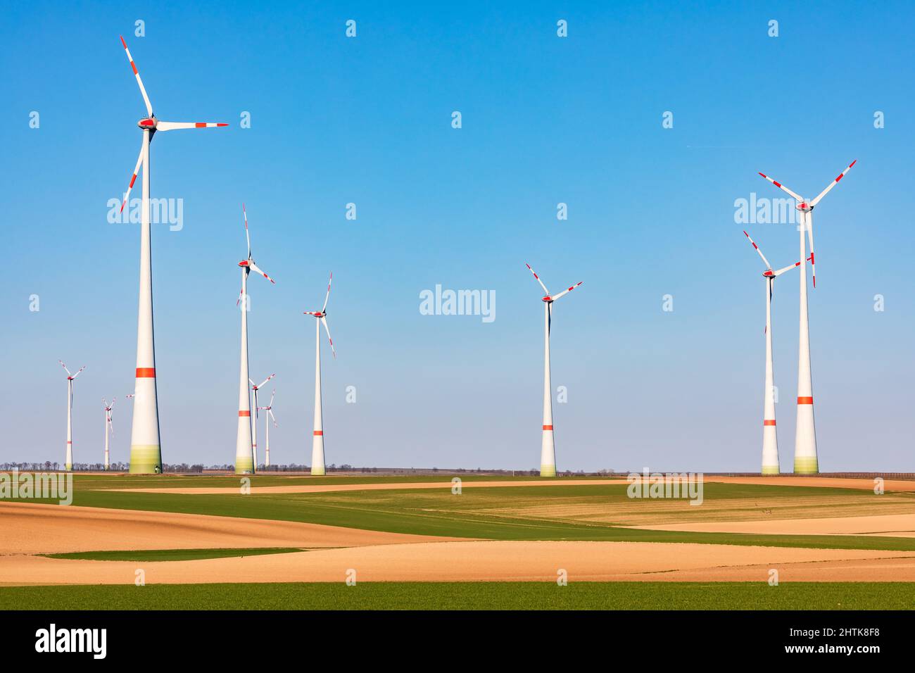 Wind turbines dominate the landscape to achieve the Energiewende Stock Photo