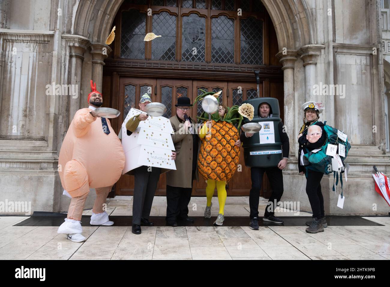 London, UK. 1st March, 2022. Inter-Livery Pancake Race participants in fancy dress at the Guildhall yard on Shrove Tuesday. Although the race , organised by the Worshipful Company of Poulters, was called off due to rain, the livery companies still raised funds for the Lord Mayor's Charity. Credit: Andy Sillett/Alamy Live News Stock Photo