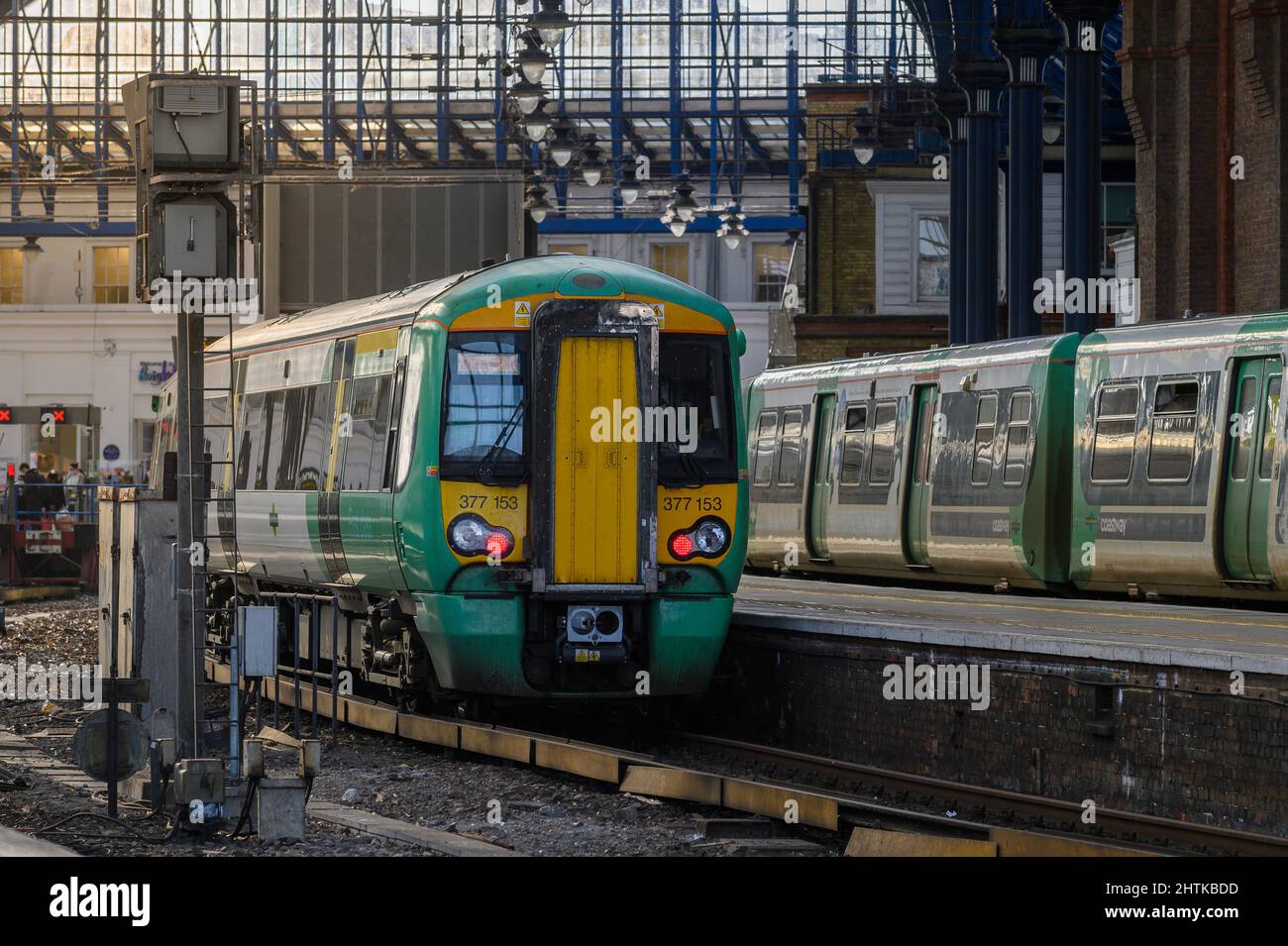 British rail class 377 train in Southern livery waiting at a platform in Brighton Railway Station, England. Stock Photo