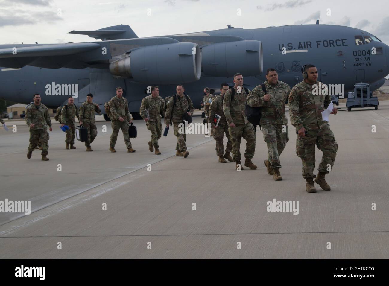 Fort Bragg, United States. 03 February, 2022. U.S. Army paratroopers, with the 82nd Airborne Division, board a C-17 Globemaster III transport aircraft for deployment to Poland from Fort Bragg airfield, February 3, 2022 in Fort Bragg, North Carolina. The soldiers are deploying to Eastern Europe in support of NATO allies and deter Russian aggression toward Ukraine. Credit: Sgt. Erin Conway/U.S Army/Alamy Live News Stock Photo