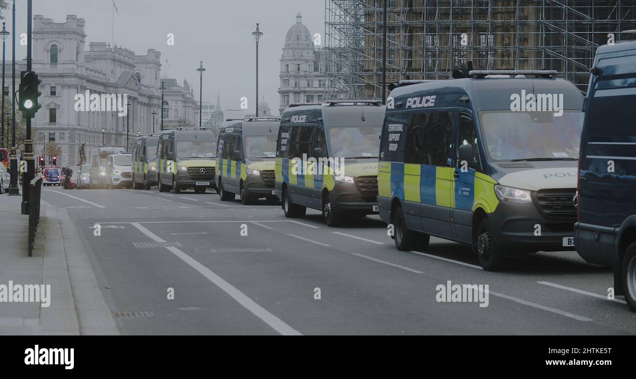 London, UK - 11 20 2021:  Territorial Support Group Police vans on Abingdon Street following an Insulate Britain march, on route to Lambeth Bridge. Stock Photo