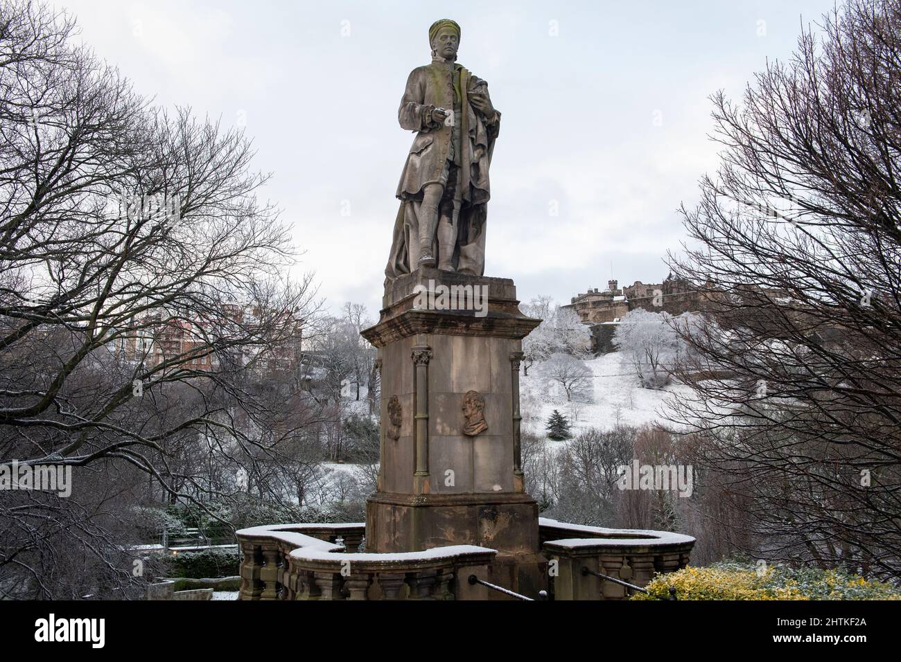 The Allan Ramsay Monument and Princes Street Gardens in the snow, Edinburgh, Scotland Stock Photo