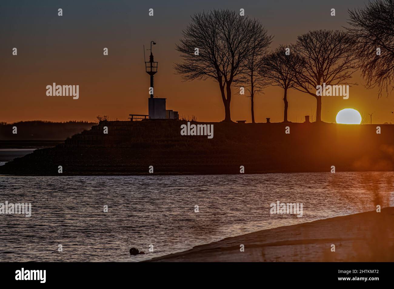 Saint Valery sur Somme, le soleil se lève dans la baie de Somme . Stock Photo